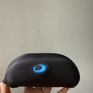 Costa Black Case with Blue Logo Tag
